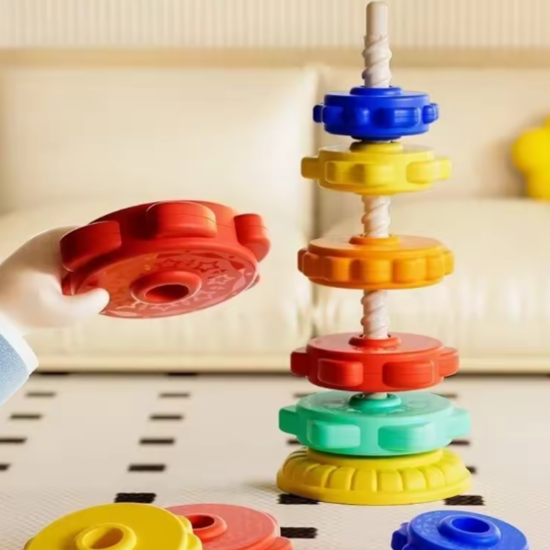 Rainbow spinning and colour tower toy